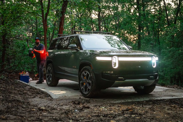 Evan is ready with the electric chainsaw