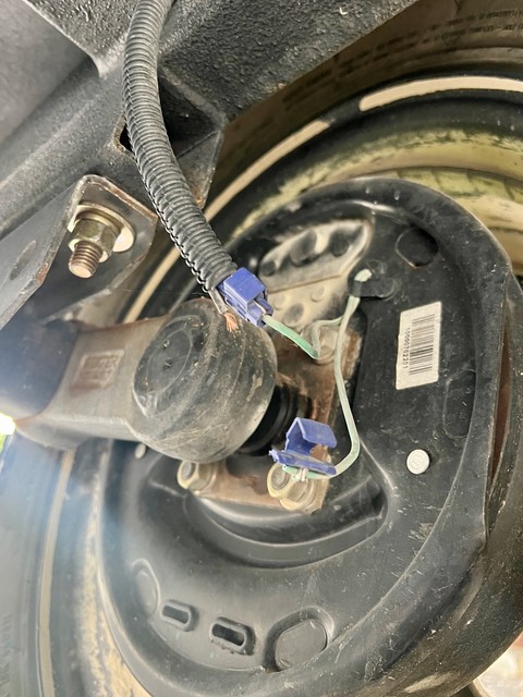 Just noticed that my trailer brakes had a busted connection... who uses these kind of connectors below a vehicle?
