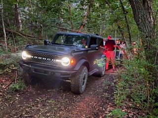 Dropping trees between the bronco and camper, haha