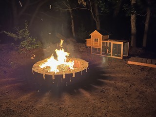 We made that fire pit out of $35 worth of landscape blocks that alissa grabbed from the restore. the tiny home in the background is for the cats, lol