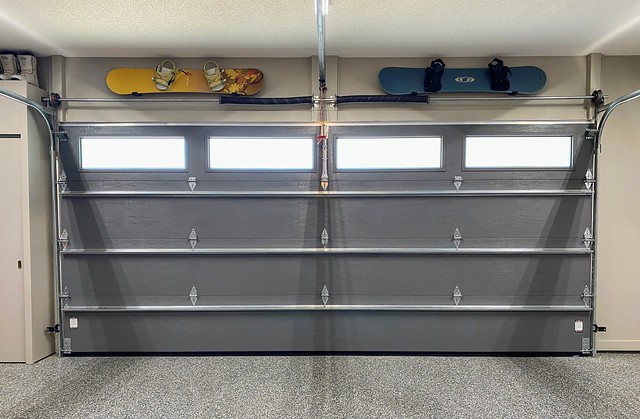 Snowboards back up above the new garage door