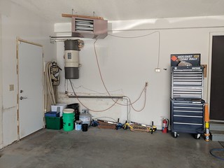 The front wall seemed like a good place to have a low profile workbench.