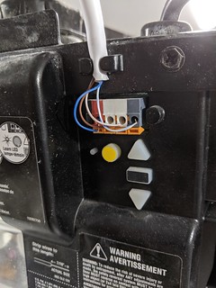 I moved the low voltage garage door wires into the ceiling and replaced the grungy old connection...