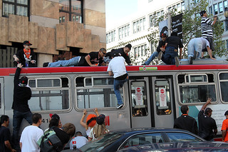 I bet we could see better on top of this bus...