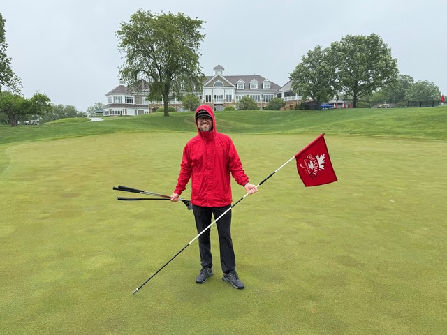 I accidentally walked off with the flag a few holes back... so Ben had to capture this on the 18th.
