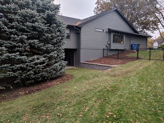 Replaced the railroad ties with a stone wall. This will be a garden next year.