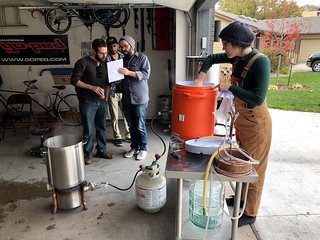 Homebrew - Reviewin the recipe while Emily takes some grain for cookin
