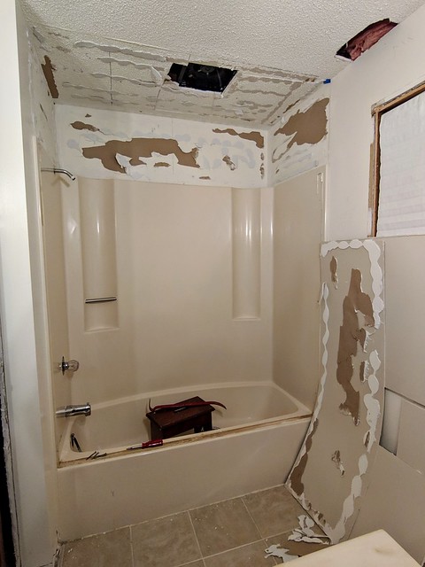Shower surround coming down