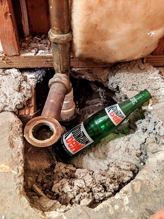 Found a treasure while cutting the 37 year old shower out of my basement bathroom