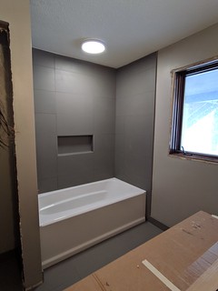 Shower tile done with the new light/fan fixture up