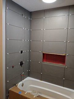 The tile installers really appreciated how I lined all of the fixtures up along grout lines. More...