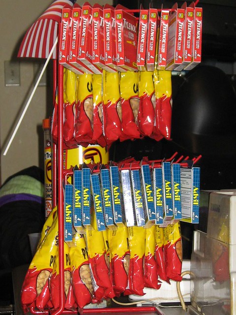 One of the best "snack racks" i've seen at a bar - Tylenol, Cashews, Advil, and Peanuts