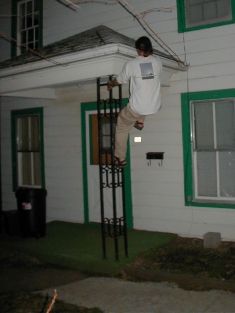 Tom climbing the Theta House