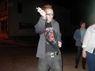 Harper putting on his belt