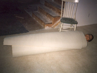 Rolled up in some carpet