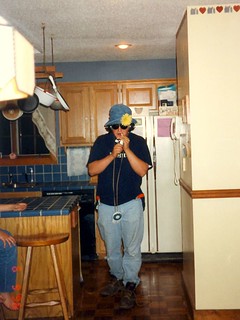 Josh - flower hat, headphones, sunglasses, candy cigarette, zippo, rubberband fan, and 2 cap guns.