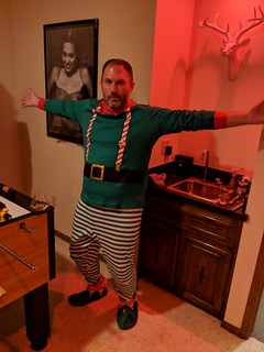 Jim was like a Christmas superman. 1 second he was wearing nice clothes, the next he was in this.