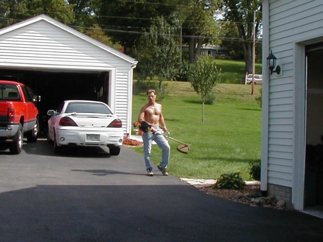 My dad doesn't do ANYTHING physical with his shirt on. this photo rules, haha.