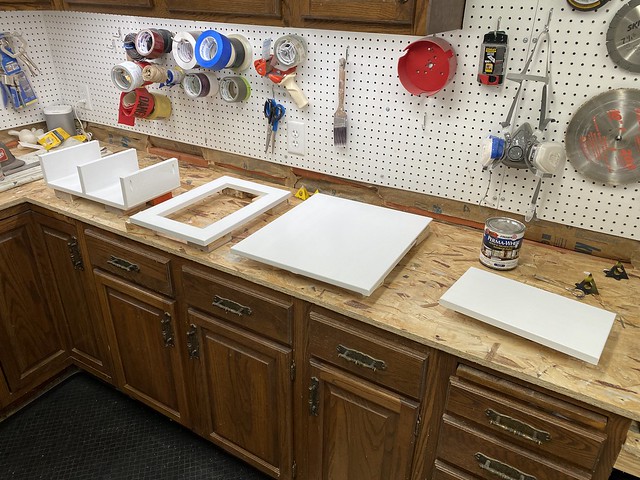 Paintin up the shelves and tap box door