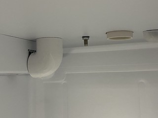 Routing cool air from the freezer to the tap box