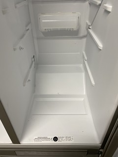 The part where the compressor sits didn't allow the kegs to sit deep enough for the door to close...