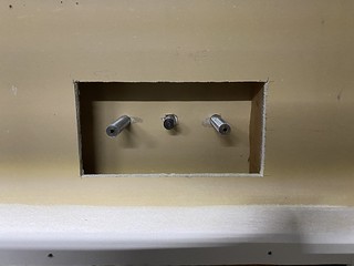 Cuttin into the wall for the taps