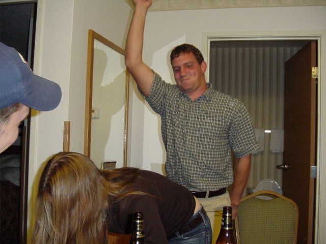 A glass broke, Becky started cleaning, and chuck jumped at the opportunity