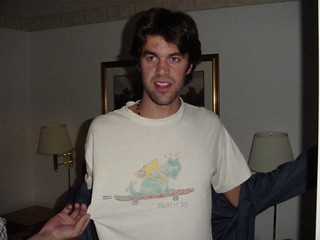 Skatin' By.  One of those free shirts you get for filling out a credit card sign up sheet or something.