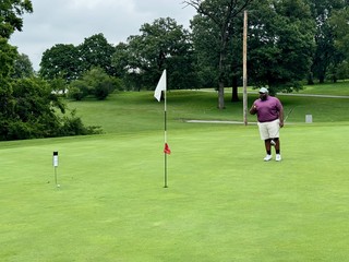 Golf - I beat Dwana's brother by inches, lol