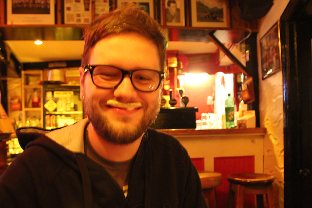 Guinness foam mustache at dinner