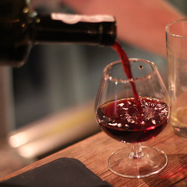 Pouring Kari's first brandy and port