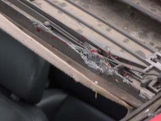 Broken - Parts of Jason's flesh and hair in the sun roof