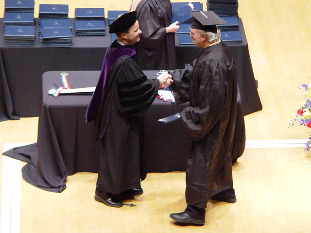 Jeff getting his diploma