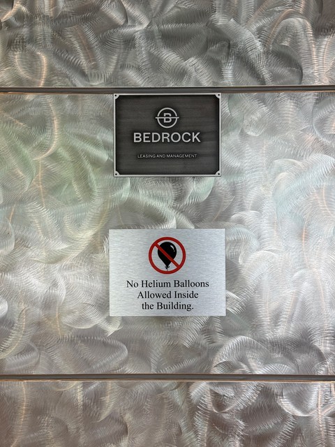 No helium balloons allowed inside the building