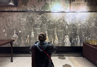 Art - These men were etched into the drywall. It was wild.