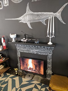 Tech - This is a Mac Mini that simply runs a fireplace visualization on a TV.