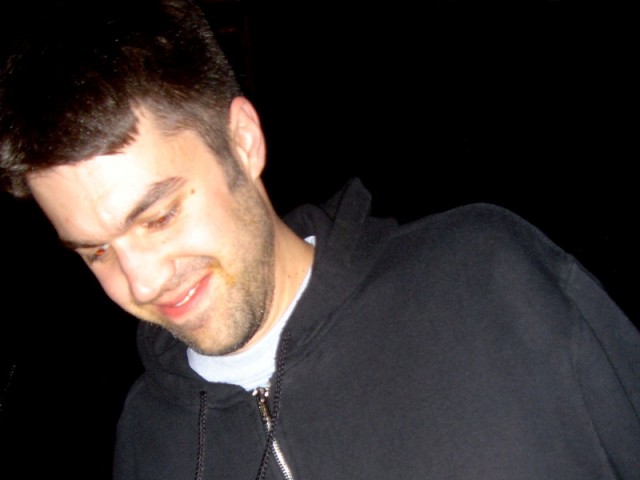 Josh dancing with hot sauce on his face