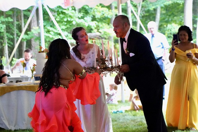 Jourdan and Alessandro blow out the candles