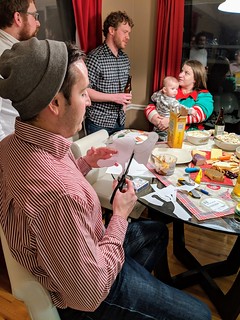 Cuttin out the crown for the winner of the King's cakes