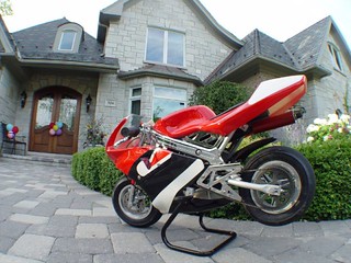 My pocket bike parked outside of Steph's