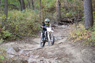 Steve's son ripping around the trails