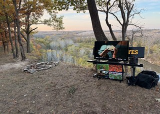 Evan set up some TVs to watch the game on the bluff