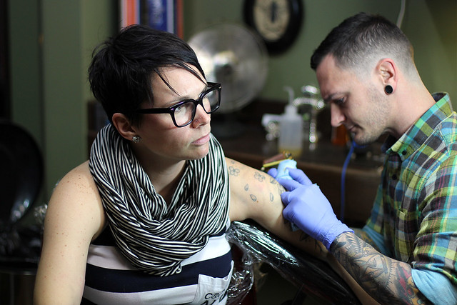 Getting touched up on her other arm