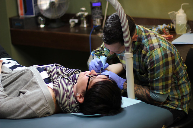 Getting tattooed by Joshua Bowers