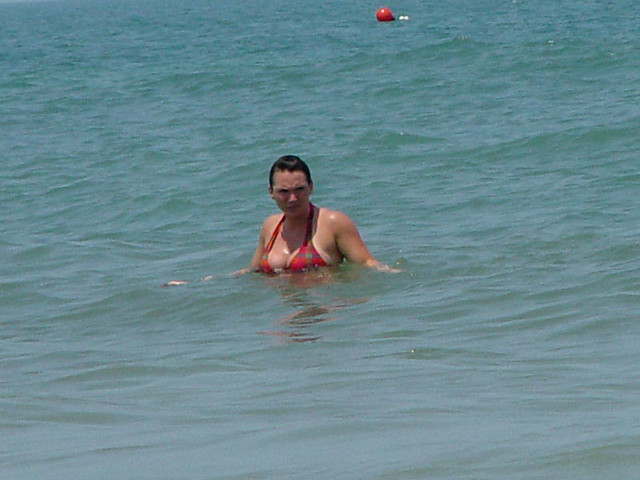 Kari watching the stuck van from the ocean