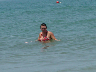 Kari watching the stuck van from the ocean