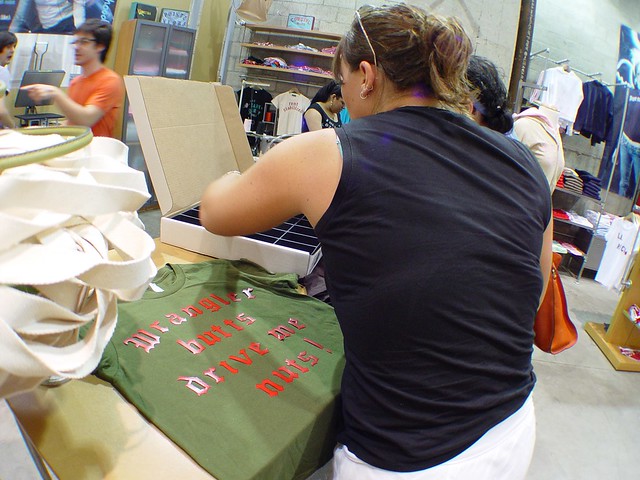 Kari making her Neighborhoodies Wrangler Butts shirt