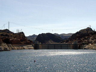 Hoover Dam from our paddle boat.  The construction you see is for the new bridge they're putting ...
