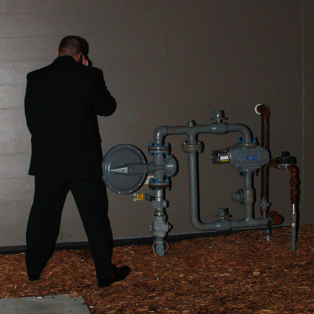 Some random dude in a suit peeing on Wellmans