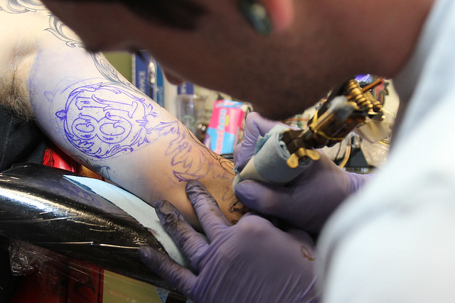Getting tattooed by Joshua Bowers